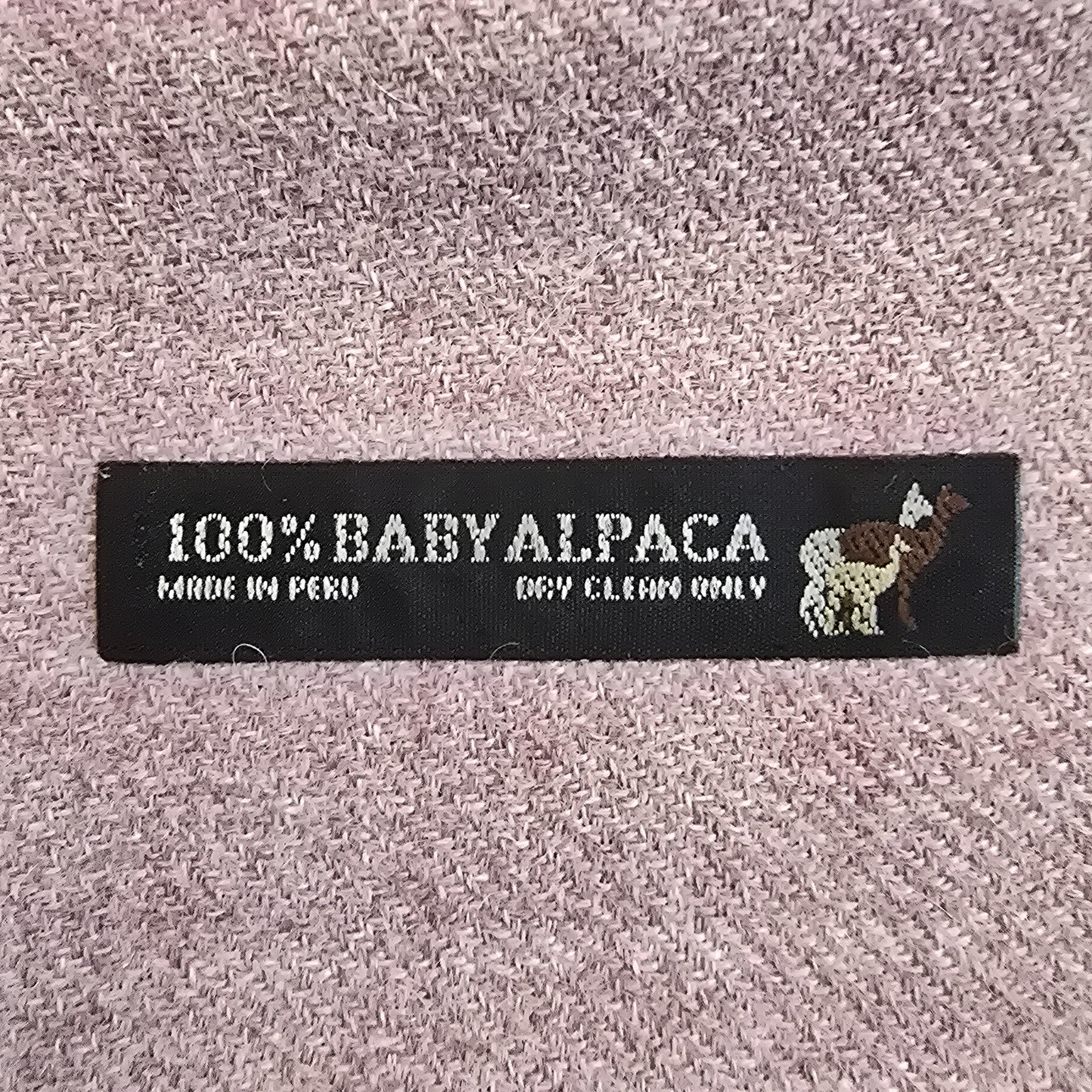 100% baby alpaca Made in Peru label on scarf