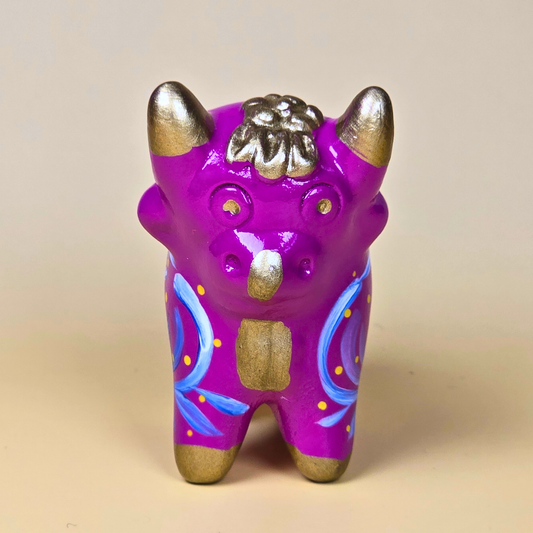Purple Torito de Pucará hand-painted ceramic bull from Peru