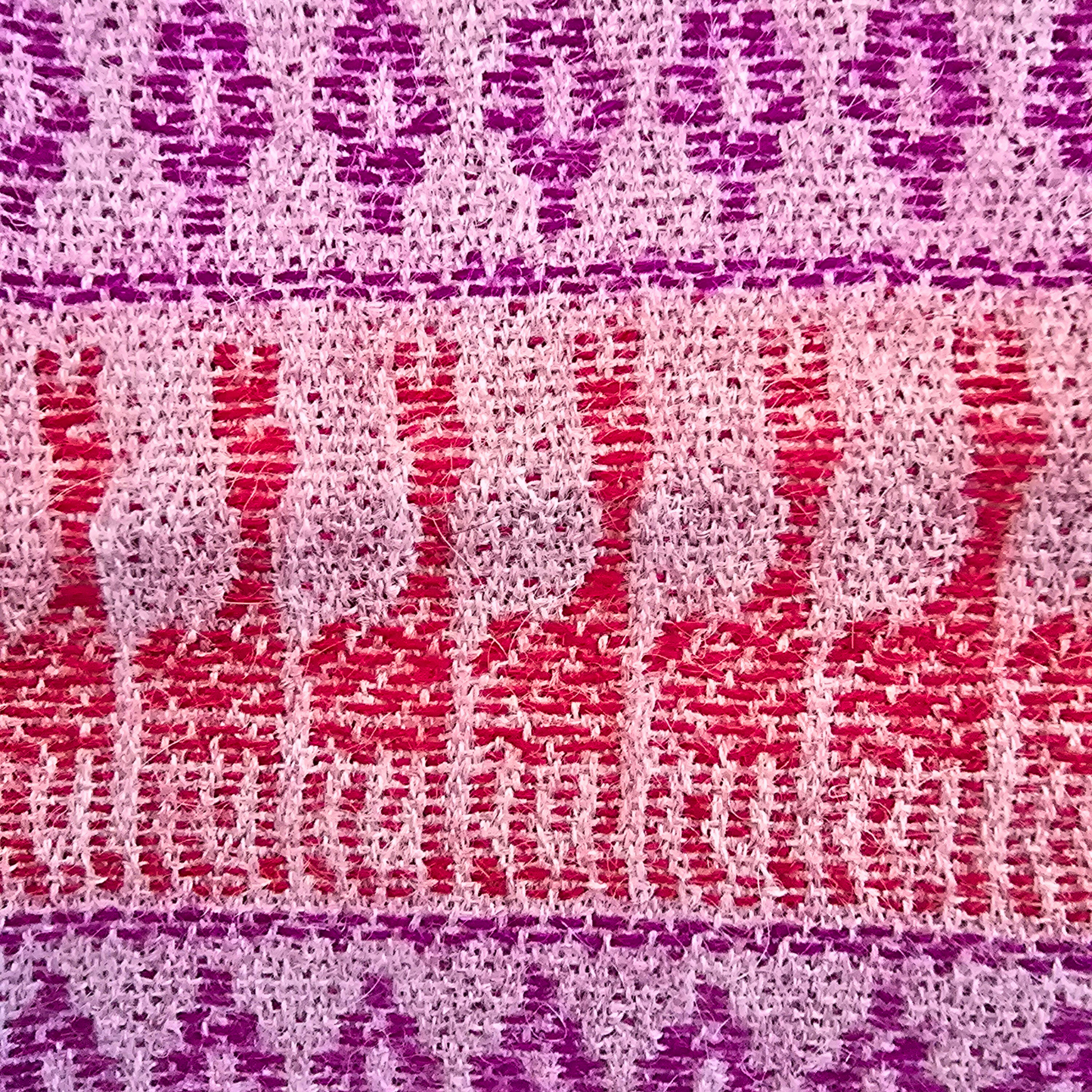 Woven Andean pattern detail on pink baby alpaca scarf