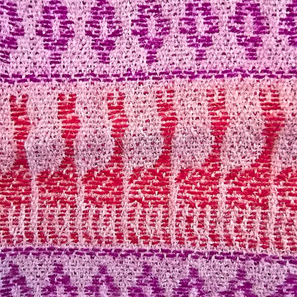 Woven Andean pattern detail on pink baby alpaca scarf