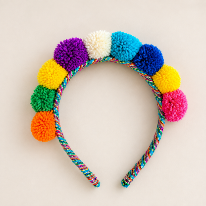 Rainbow Mix Andean pom-pom headband handmade in Peru
