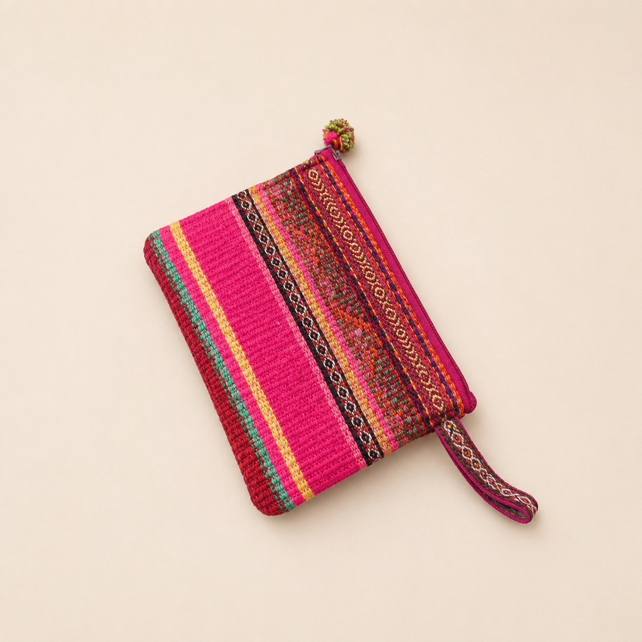Handmade Peruvian woven pouch in orchid pink with traditional Andean textile.