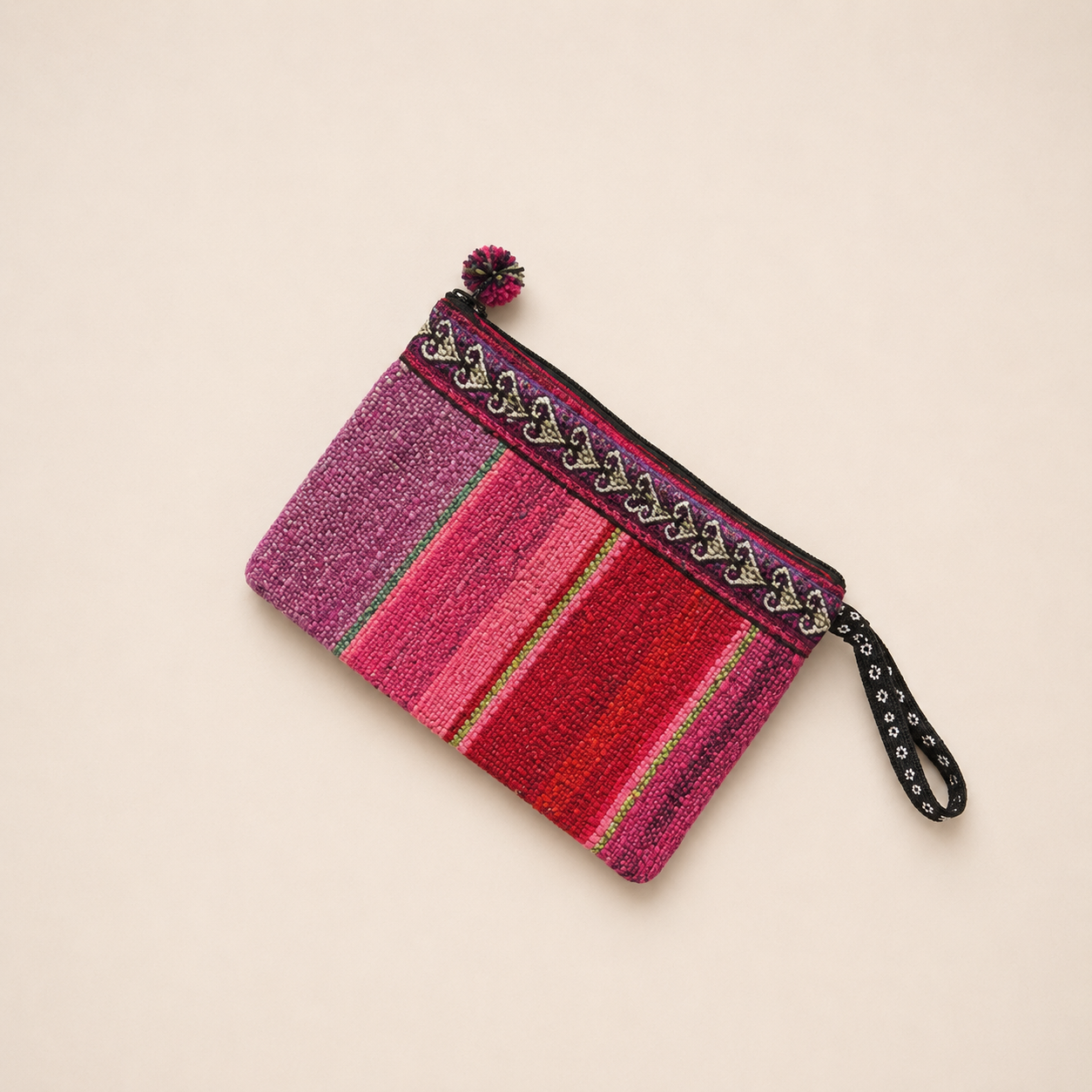 Handmade berry pink Peruvian artisan pouch.