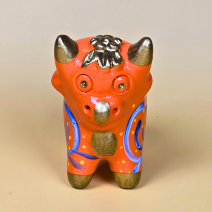 Orange Torito de Pucará hand-painted Peruvian lucky bull