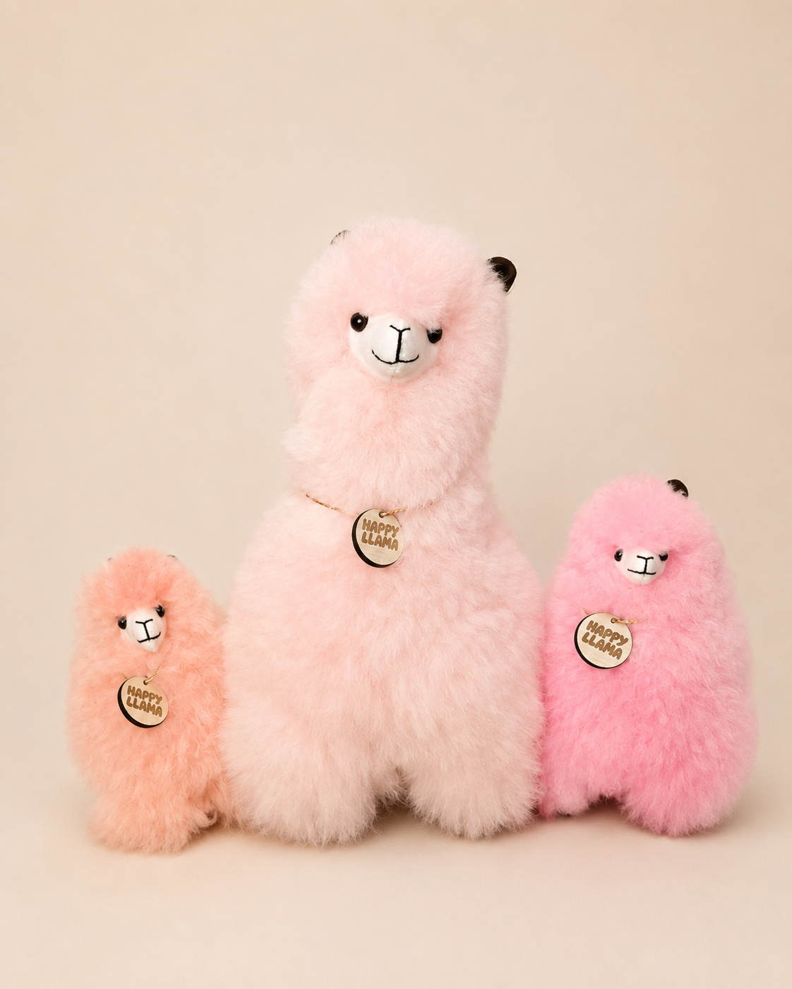 Soft Blush baby alpaca llama with pink llamas in different sizes