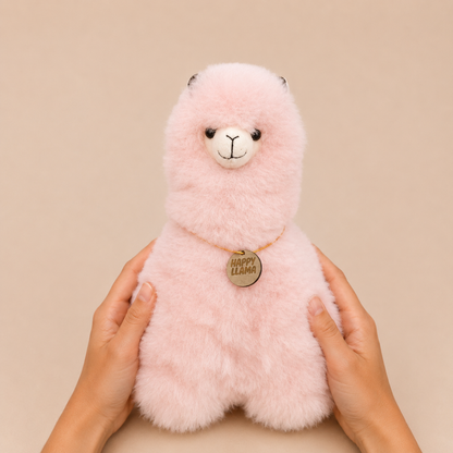 Soft Blush large handmade baby alpaca llama held in hands